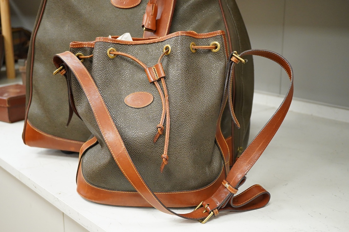 A Mulberry scotch grain leather holdall / suitcase and shoulder bag, largest 60cm high